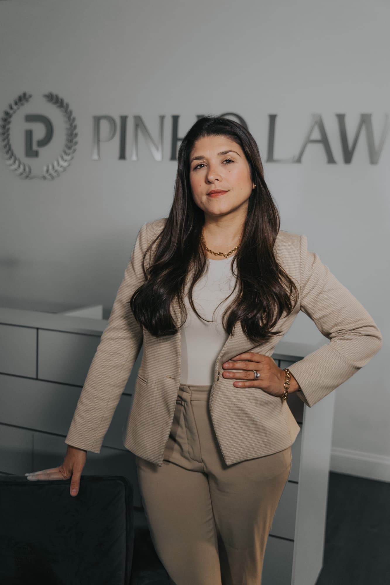 Dra. Izi Pinho, Esq. — Florida Bar, AILA since 2019, Stetson Law magna cum laude (2016). Founder of Pinho Law.